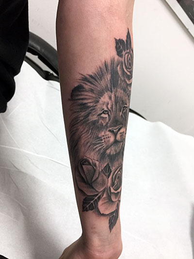 Lion with Roses Tattoo