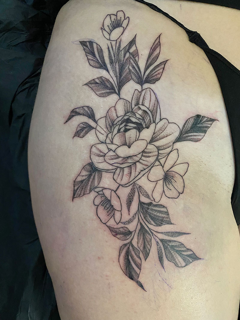 Zweig mit Blüten Tattoo